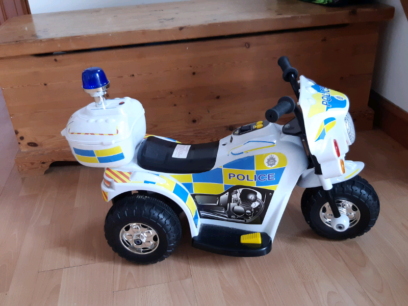 chad valley 6v powered ride on police bike
